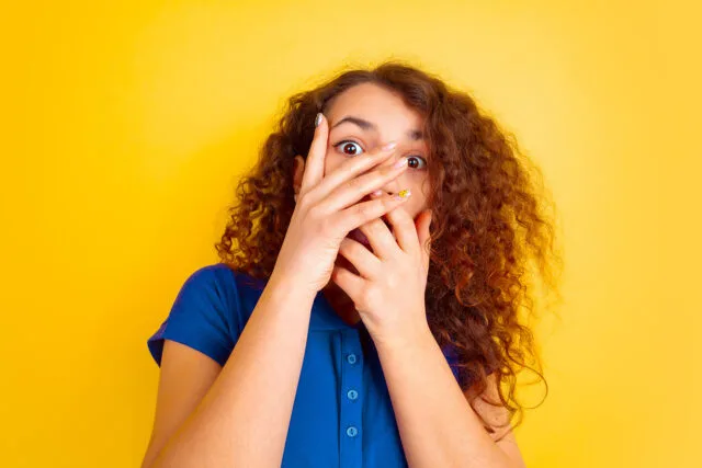Caucasian Teen's Girl Portrait On Yellow Background